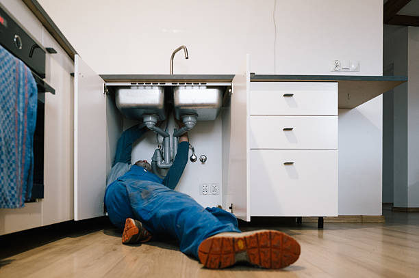 Professional Emergency Plumber technician working in Kingston, MA